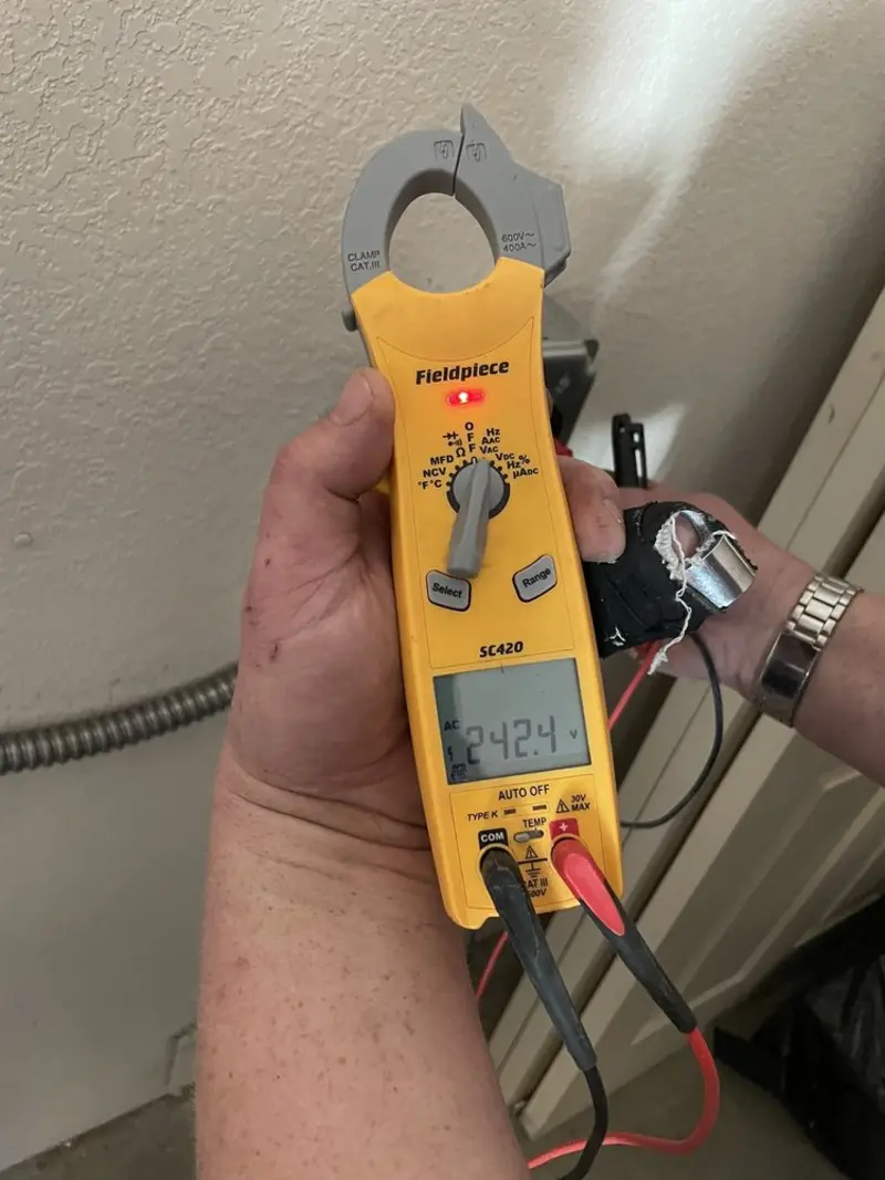 Voltage testing with clamp meter during Electrical Installation Services in Oro Valley
